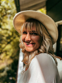 Testimonial Profile Picture of NADINE zu Blue Butterfly